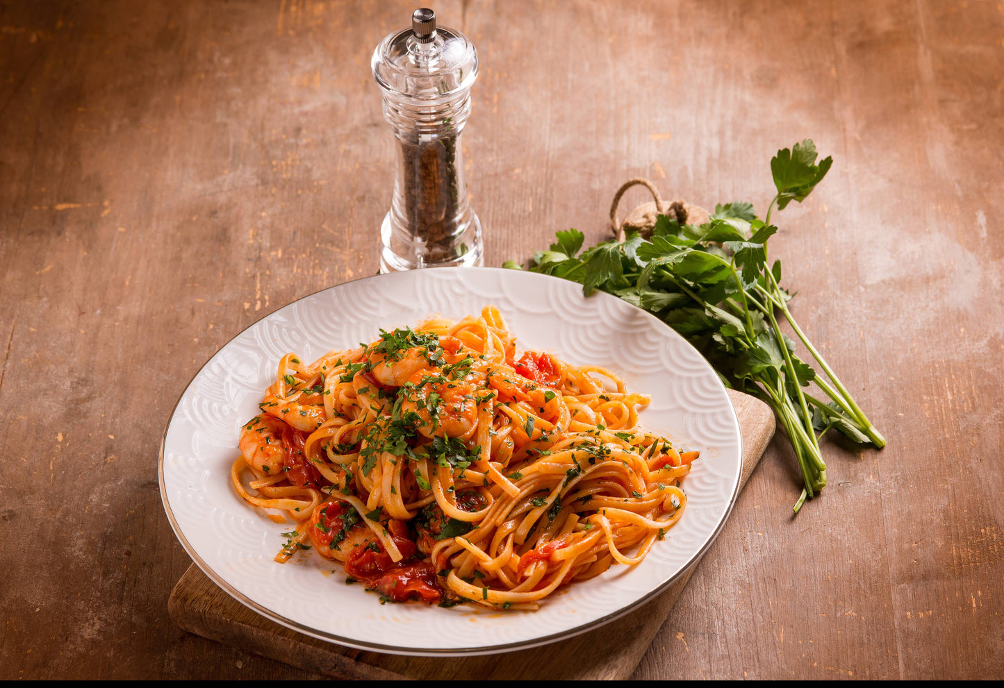 Image of a delicious bowl of pasta with prawns